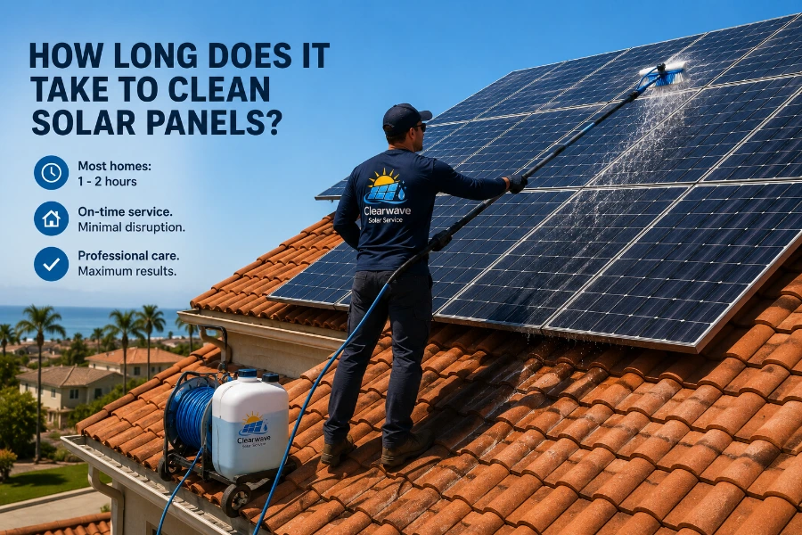 Technician using a water-fed pole to clean a solar panel array, showing the typical time required for a cleaning visit